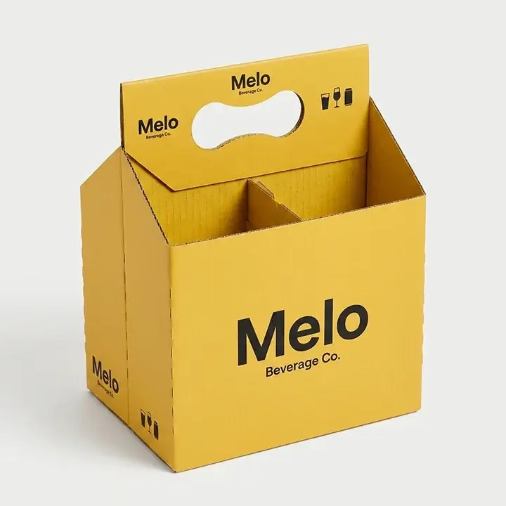 Die-cut cardboard carrier box with handle